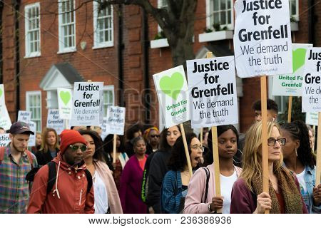 London, United Kingdom, 14th April 2018:- Marchers On A Silent March From Kensington Town Hall To Th