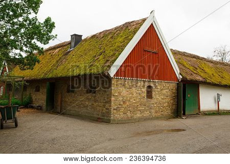 Traditional Old Farm At Skansen Park, The First Open-air Museum And Zoo, Located On The Island Djurg