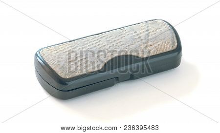 The Dark Plastic Case For Glasses Trimmed In Suede On A White Background