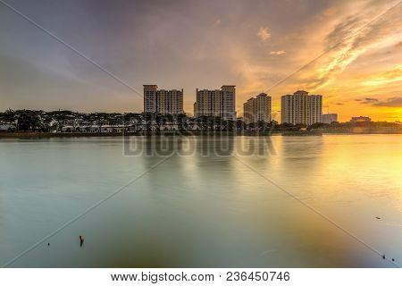 Beautiful Landscape Abstract Citybackground And The Light Of Sun Reflection Building On Water.panora