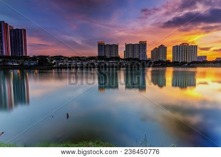Beautiful Landscape Abstract Citybackground And The Light Of Sun Reflection Building On Water.panora