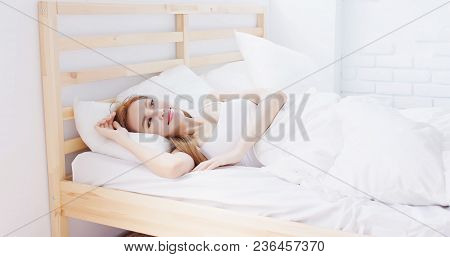 Woman Wake Up On Bed In The Morning