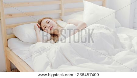 Woman Sleep On The Bed At Home In Morning