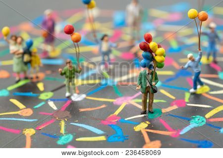 Social Network Concept, Miniature People Holding Balloons Standing On Colorful Pastel Chalk Line Lin