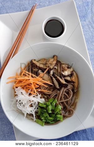 Japanese shiitake, soba, and vegetables soup