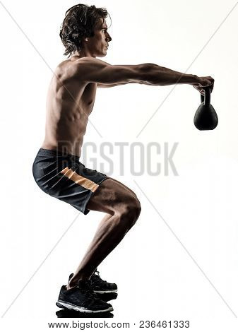 one caucasian man fitness weitghs training exercises  studio in silhouette isolated on white background