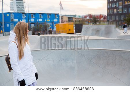 Young Girl Standing By The Saktepark In Malmo