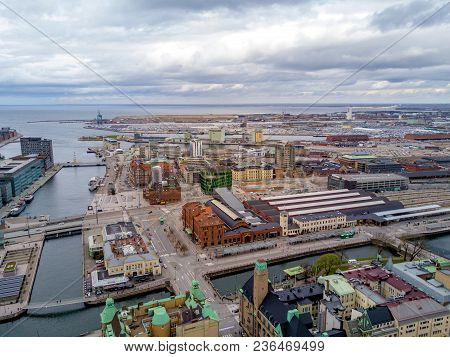 Aerial Malmo City View From Above With Harbour, Turning Torso And The Bridge On The Horizon