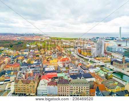 Aerial Malmo City View From Above With Harbour, Turning Torso And The Bridge On The Horizon