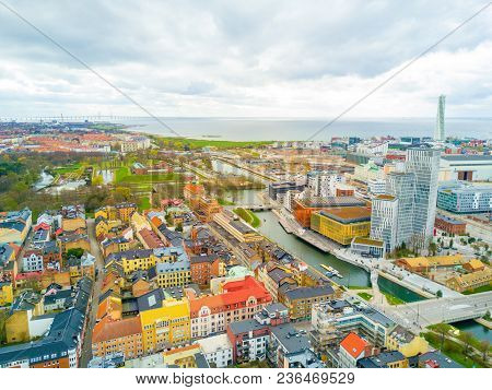Aerial Malmo City View From Above With Harbour, Turning Torso And The Bridge On The Horizon