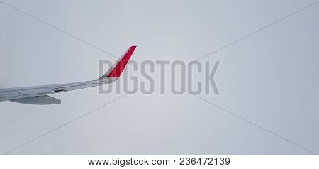 Right Jet Plane Wing In Mist That Make The Turbulence