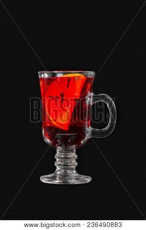 Monochrome Transparent Cocktail, Red Mulled Wine In A High Glass With A Handle With Spices And A Sli