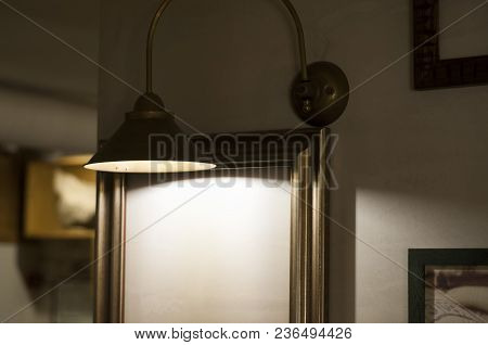 Metal Brass Light Fixture Fixed On The Wall