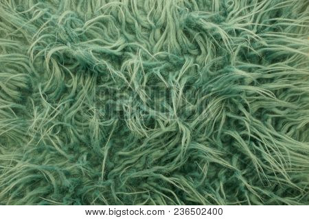 Green Fabric Background Of Long Wool On Clothes