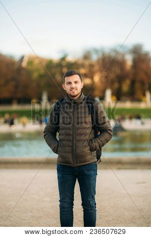 Handsome Man Posing For Photographer In Pakr.