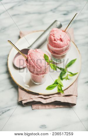 Healthy Low Calorie Summer Dessert. Homemade Strawberry Yogurt Ice Cream In Glasses Over Light Grey 