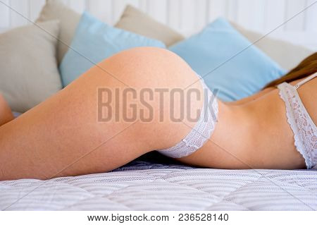 A Portrait Of A Beauriful Woman In A Lingerie