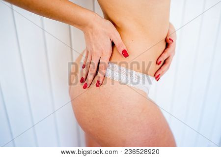 A Portrait Of A Beauriful Woman In A Lingerie
