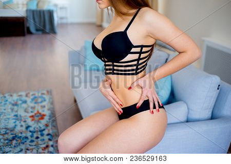A Portrait Of A Beauriful Woman In A Lingerie