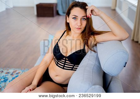 A Portrait Of A Beauriful Woman In A Lingerie