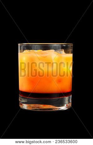 Multi-colored Two-layer Opaque Cocktail In A Low Glass With Ice Cubes With Melon, Pear, Apple, Berri