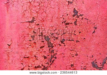 Old Rusty Metal Sheet Colored Red Paint Cracked. Abstract Background. Metallic Background.