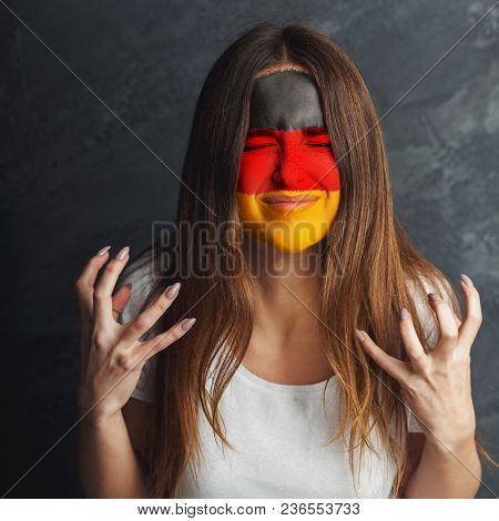 Portrait Of Sad Woman With The Flag Of Argentina Painted On Her Face. Football Or Soccer Team Fan, S