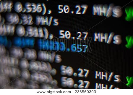 Macro Snapshot Of The Program Interface For Crypto Currency Mining On The Monitor Of An Office Compu