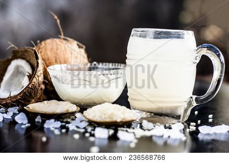 Close Up Of Famous Regional Drink Of India Apong Shrabat Or Tender Coconut Shrabat On Wooden Surface
