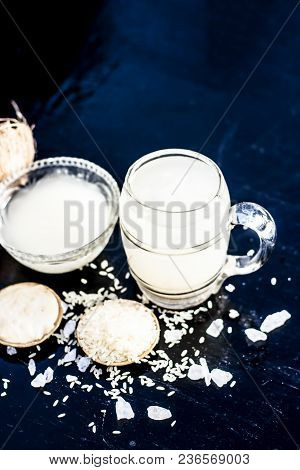Close Up Of Famous Regional Drink Of India Apong Shrabat Or Tender Coconut Shrabat On Wooden Surface
