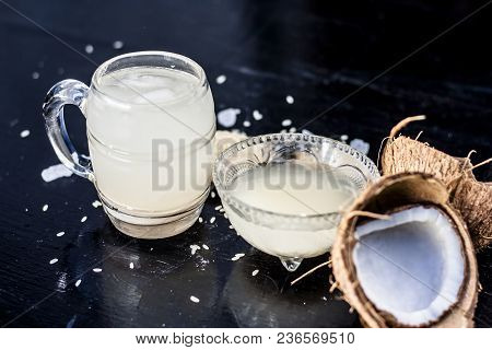 Close Up Of Famous Regional Drink Of India Apong Shrabat Or Tender Coconut Shrabat On Wooden Surface
