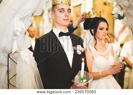 Wedding Couple Bide And Groom Get Married In A Church.