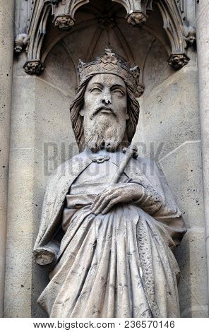 PARIS, FRANCE - JANUARY 05: Saint Gontran, statue on the portal of the Basilica of Saint Clotilde in Paris, France on January 05, 2018.