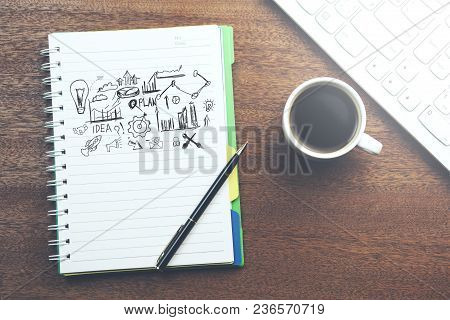 Sketching Good Ideas With Keyboard And Coffee On Table