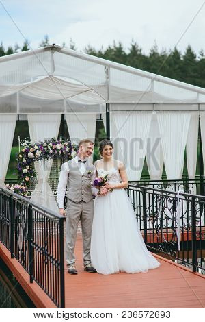 Bride And Groom Exchange Rings At The Wedding