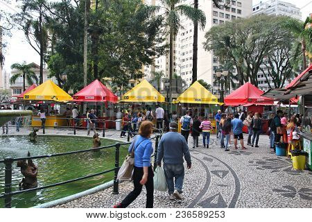 Curitiba, Brazil - October 7, 2014: People Visit Seasonal Food Fair Event At Praca Osorio Square In 