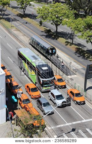 Curitiba, Brazil - October 7, 2014: Taxi Cabs Drive In Curitiba, Brazil. Curitiba Is The 8th Most Po