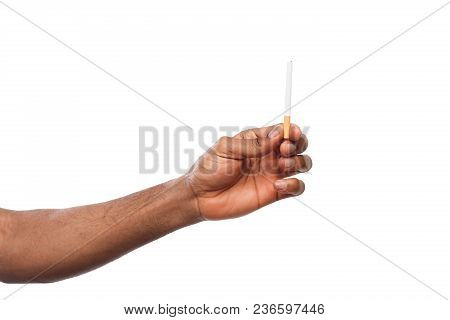 Black Male Hand Holding A Cigarette, Isolated On A White Background. Bad Habit, Smoking Concept