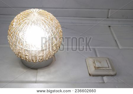 Overhead Light Fixture And Old One Gang Wall Push Button Switch. Yellow Glass, Ball Shape, Plastic B