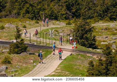 Brocken Germany - May 27. 2018: People Hiking Towards The Top Of Brocken Mountain In Germany