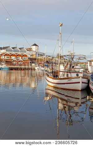 Grisslehamn, Sweden - Jul 08, 2017: Morning Light And Traditional Fishing Boats In The Small Harbor 