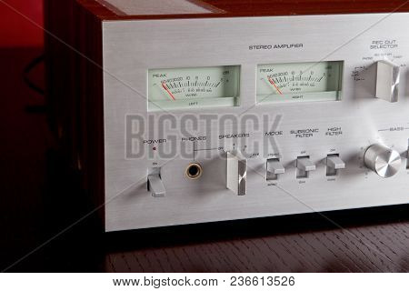 Vintage Stereo Amplifier Metal Frontal Panel with VU meters Closeup 