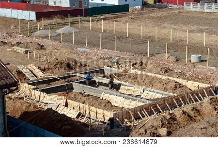 Cement-filled Foundation Of A Private House, The Foundation Of The House Under Construction, Fresh C