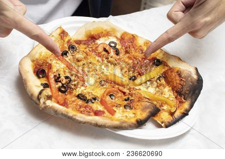 Man Pointing At Just Made Homemade Pizza