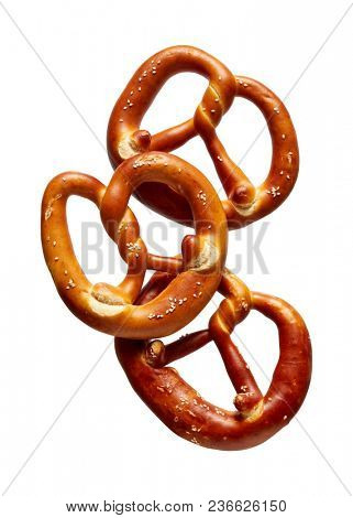 German Soft Pretzel. Three German bread pretzels on a white background.
