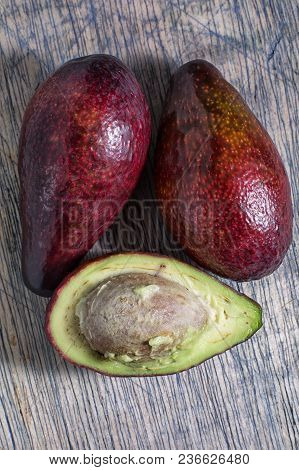Whole And Cut Red Avocado Variety In Ecuador