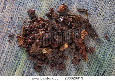 Myrrh Tree Resin Closeup On Wood Surface