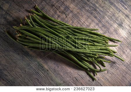 Chinese Yard-long Long Beans Bundle On Wood Surface