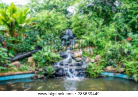 Blur Beautiful Waterfall And Garden For Background