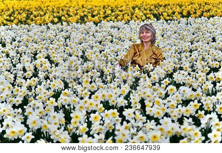 Woman In Daffodil Fields Smiling. La Conner. Anacortes. Seattle. Washington State.